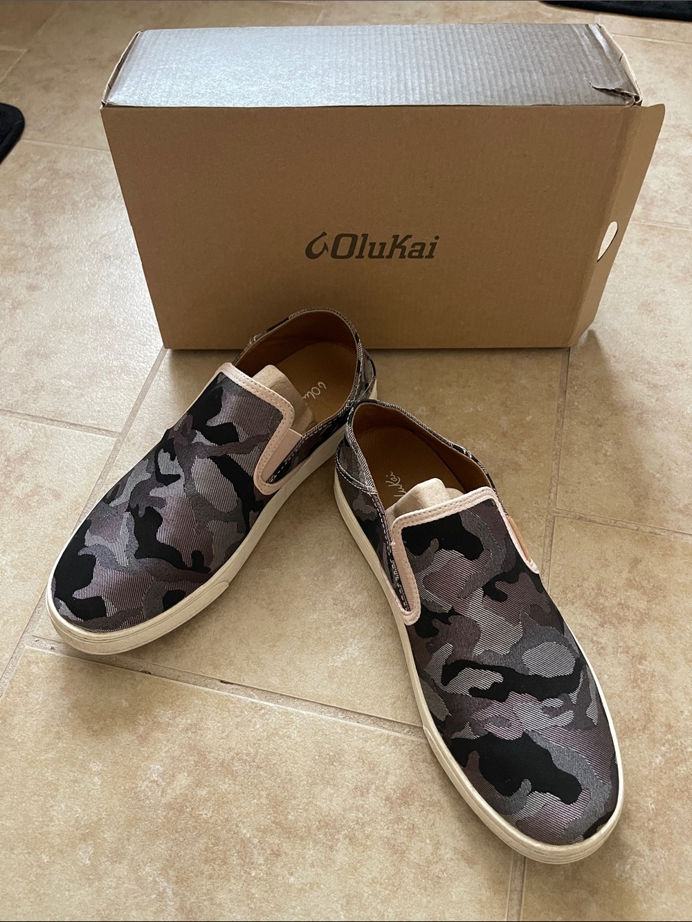 OluKai Women’s Camo Slip-On Sneakers in Black, Gray and Tan